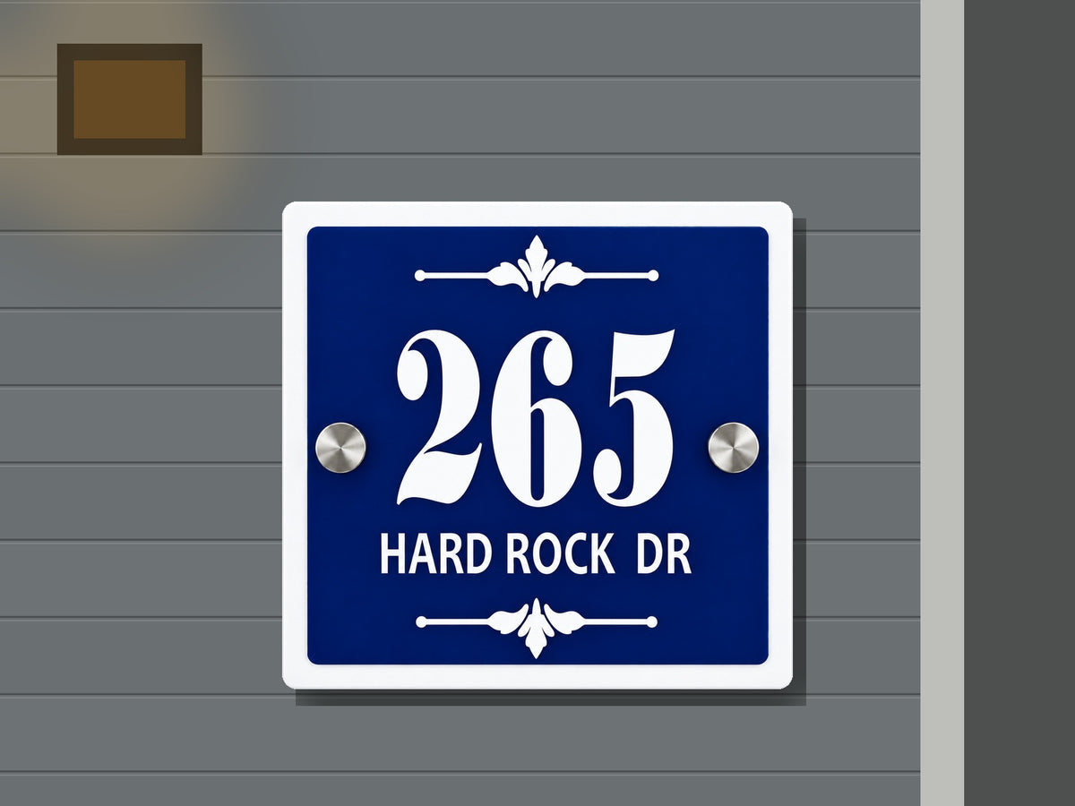 Classic blue and white address sign 265 shown installed on a contemporary home exterior
