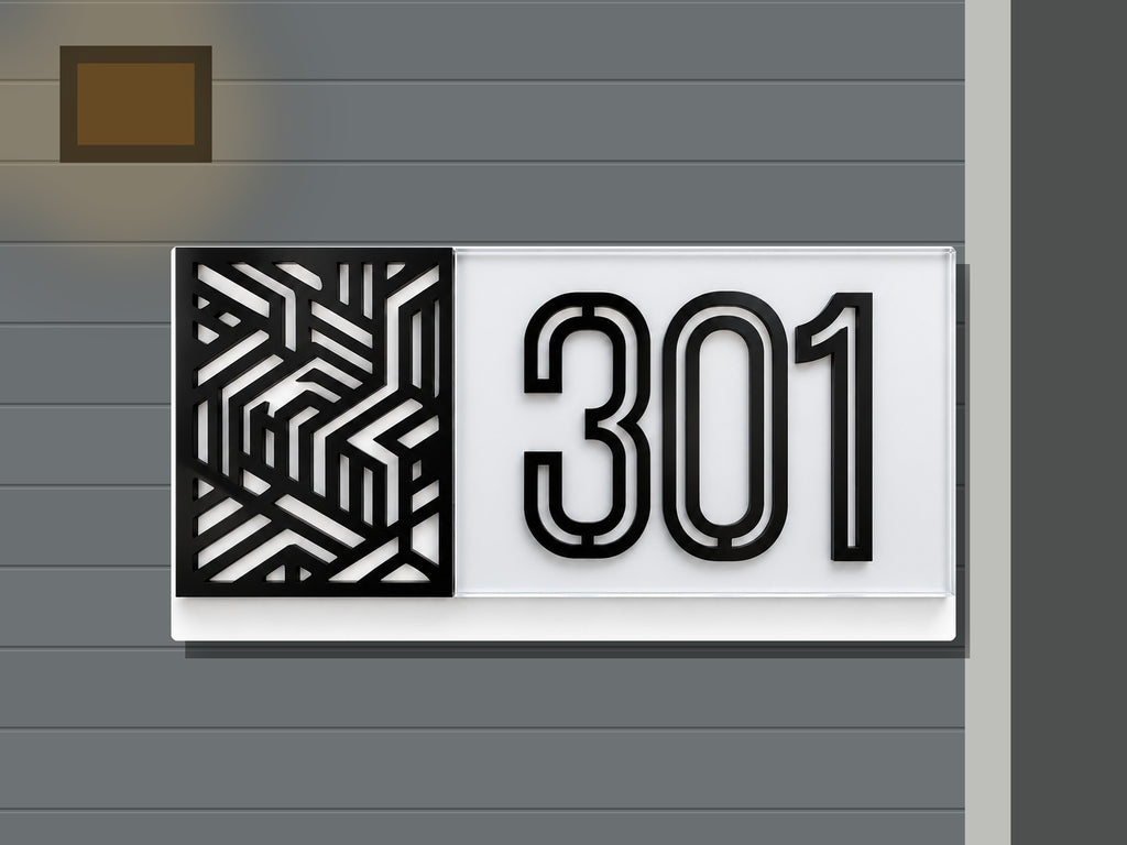 Modern geometric address sign 301 shown installed on a contemporary home exterior