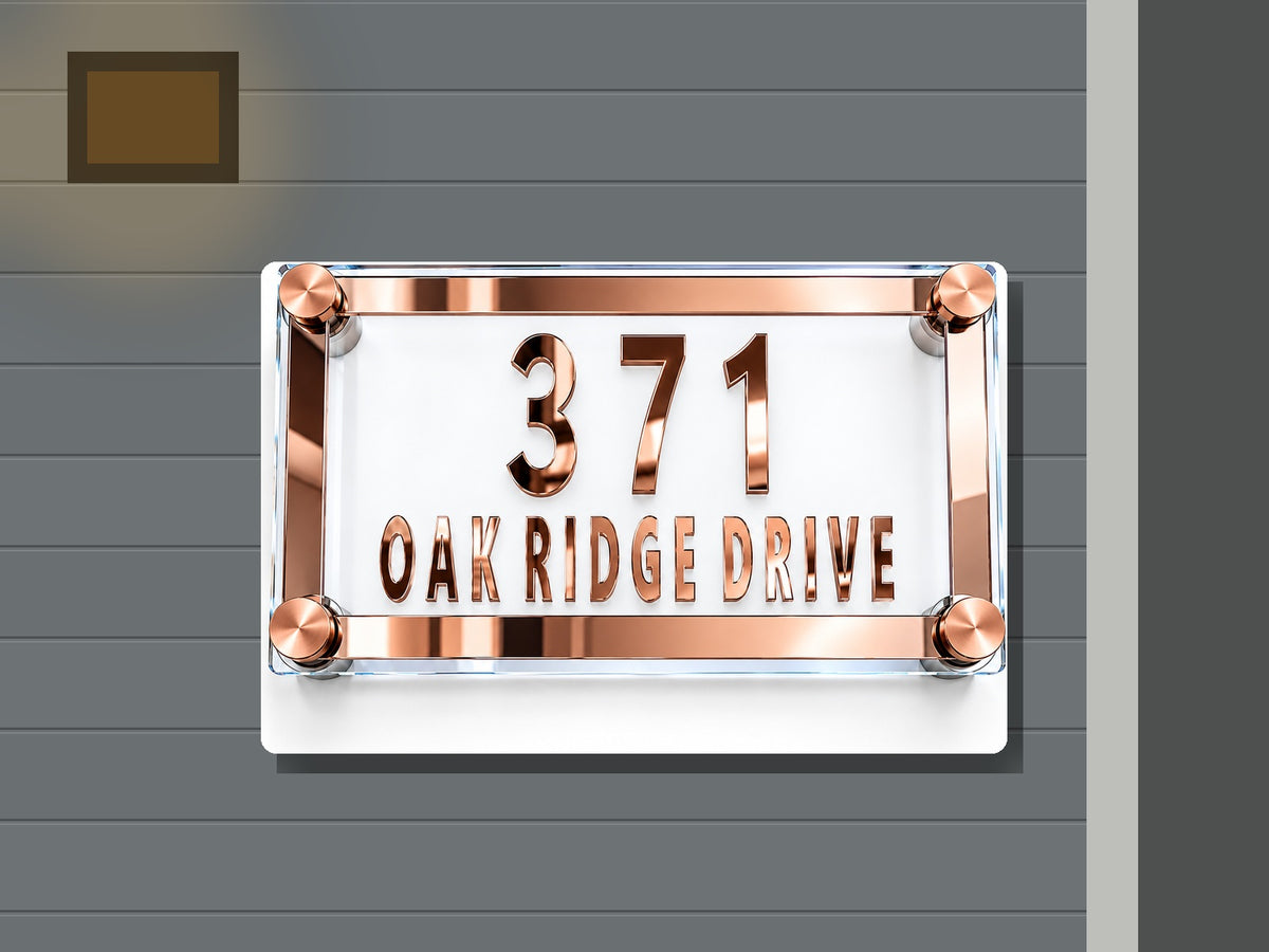 Rose gold mirror accent address sign 371 shown installed on a contemporary home exterior
